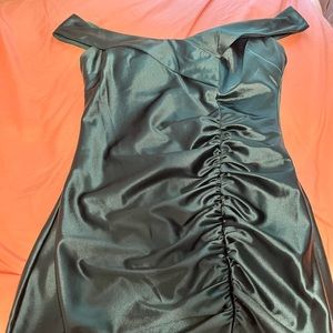 Silky, emerald, form fitting dress. Off the shoulder, size 9